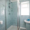 Photo 6: Communal shower room cleaned weekly 