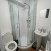 Photo 3: En-suite: Toilet, Sink, Shower - personal decorations not included.