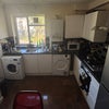 Photo 3: Kitchen with Washing maching and drier as well
