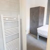 Photo 6: Heated towel rail comes standard