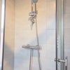 Photo 7: Thermostatic shower with mega water booster tank to ensure good pressure