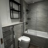 Photo 3: Main downstairs bathroom 