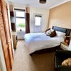 Photo 1: Bedroom Leading to Balcony