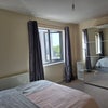 Photo 4: Bedroom - double wardrobe with mirror, lots of storage