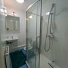 Photo 6: Super clean , large shower room. Not a cubicle Get cleaned and bleached daily.
