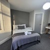 Photo 2: Bedroom of similar size and layout