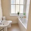 Photo 2: Bright bathroom away from Main Street 