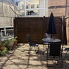 Photo 5: Our little garden (alliums and herbs growing currently, table and chairs great for Summer)