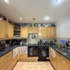 Photo 6: Kitchen has decent size fridge/freezer, dishwasher (under repair currently), electric hob and oven, 