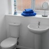 Photo 3: Shares a clean and modern bathroom....