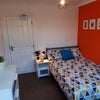 Photo 2: Brighten up your life with a splash of orange! Welcome to your new room......