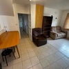 Photo 8: Relaxing shared living and dining area.