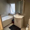 Photo 4: Upstairs bathroom (used by the three other tenants upstairs)