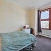 Photo 7: First floor bedroom 