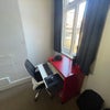 Photo 2: Desk and chair come with the room
