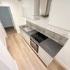 Photo 1: 4-STUDIO SUITE SHARED KITCHEN