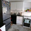 Photo 6: The kitchen