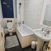 Photo 9: Hallway bathtub
