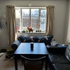 Photo 5: The living room is paired with the kitchen and you are free to use utensils. 