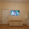 Photo 5: Smart TV and Wash Basin