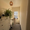 Photo 4: Upstairs hallway just outside the room with chest of drawers for your use.