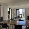 Photo 2: Livingroom and dining area