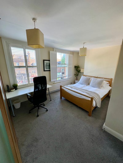 Large Primary Bedroom - Bright & Airy for Summer Main Photo