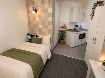 Pack your bags, your new Studio awaits!  Main Photo
