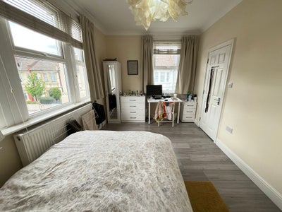 Large bedroom with private fridge in a clean home Main Photo