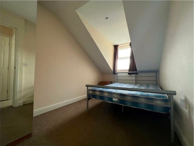 A double bed in a 4 bedroom apartment (loft area) Main Photo