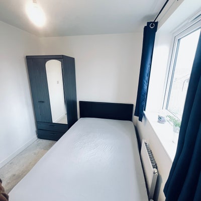 En-suite bedroom in Modern Home Main Photo