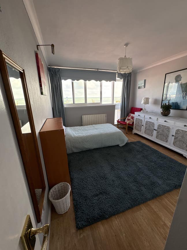Spacious double bedroom with direct sea views  Main Photo