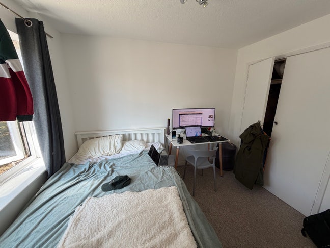 Bedroom in three Bedroom Apartment Main Photo