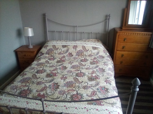 A sunny upstairs double bedroom . Main Photo