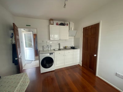 1 bedroom, living area with kitchen, shower room.  Main Photo