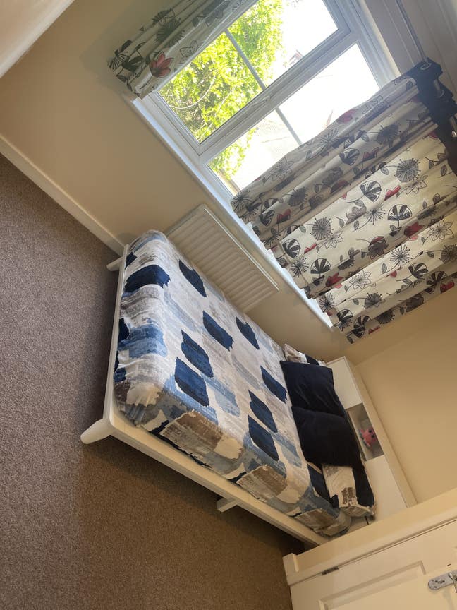 Double room with a private attached shower.  Main Photo