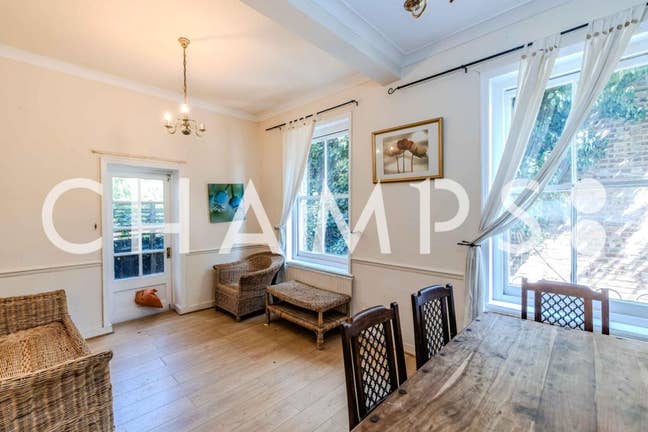 Cosy, solid-wood home is just missing final member Main Photo