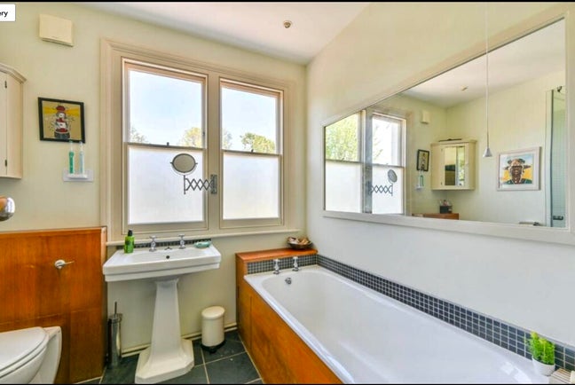 Large Double Bed in Bright Arty Kensal Green House Main Photo