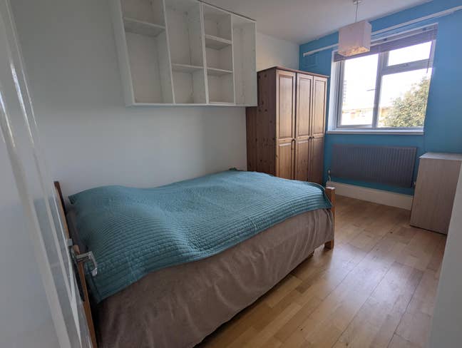 Clean Double Room within a friendly community Main Photo