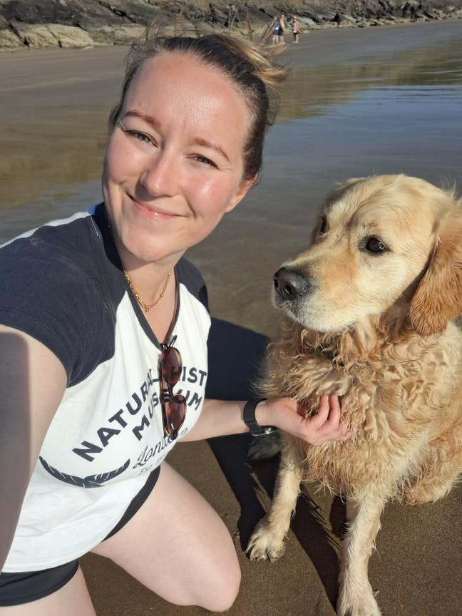 Professional female & her golden retriver looking  Main Photo