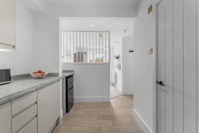 Now &pound;995 | Ground floor suite with own patio Main Photo