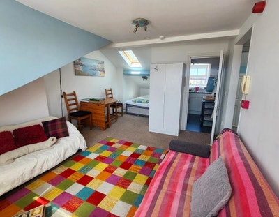 Spacious yet cosy Furnished Top Floor Studio  Main Photo