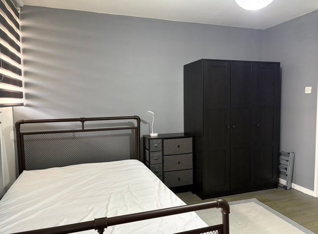 A Double room in a simple home  Main Photo