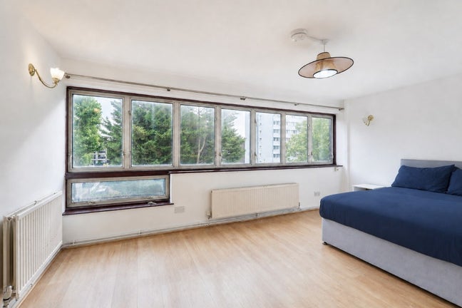Bright Master Room with Wall of Windows Main Photo