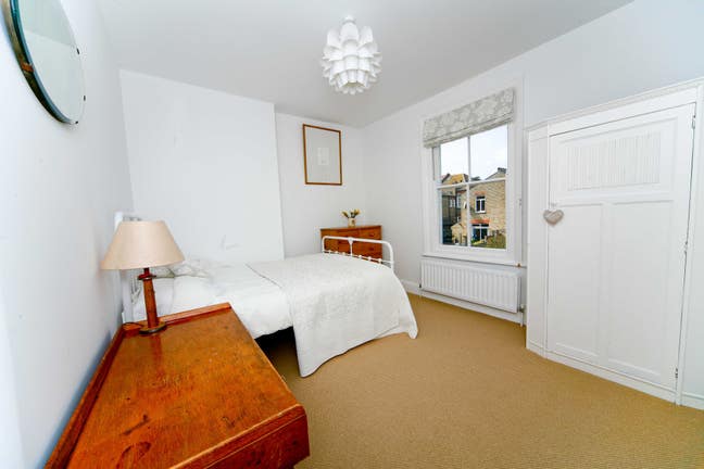 Large bright room for rent in family home.  Main Photo