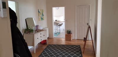 Double room in bright garden flat with fun family Main Photo