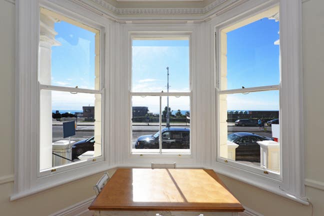 Spacious & stylish 2 bed seafront garden flat Main Photo