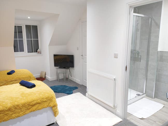 A Double Bedroom with en-suite in our home.  Main Photo