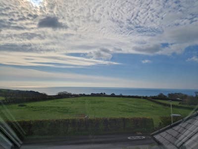 Large double room en-suite with sea view Main Photo