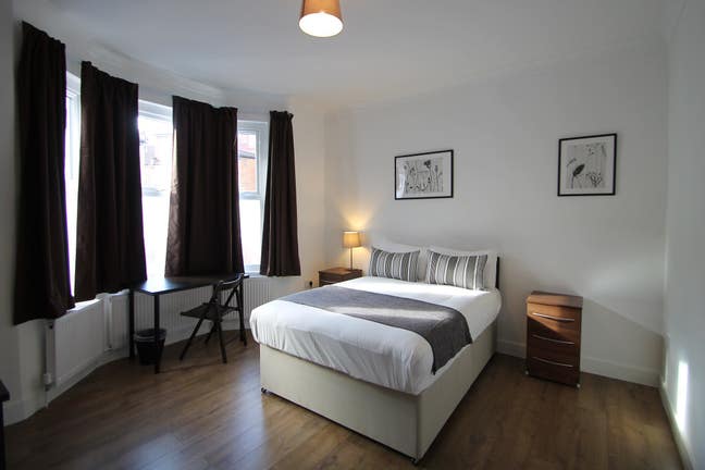 Large double room with a private fridge.  Main Photo